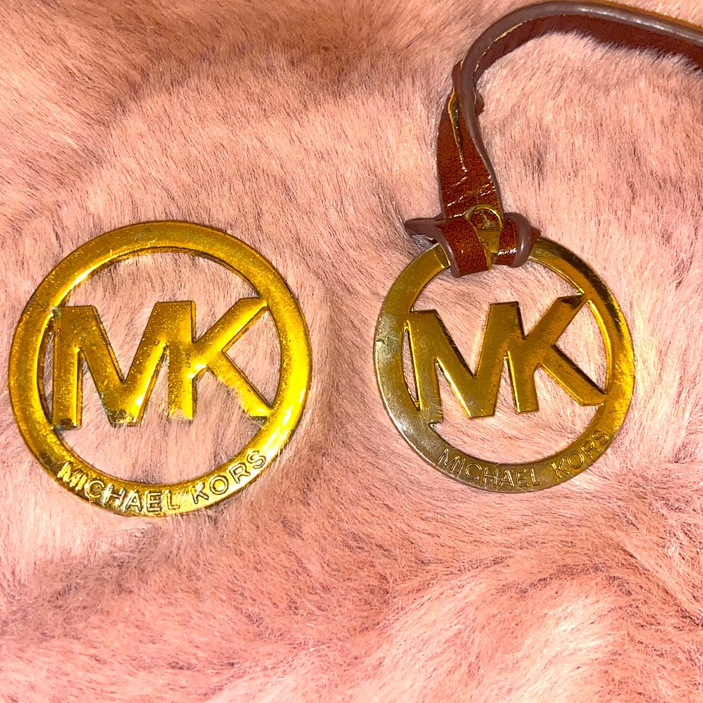 MK set of 2 Michael Kors Gold emblems one with leather strip
